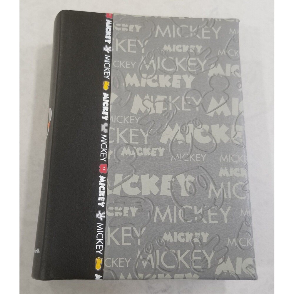 Disney World 4x6 Photo Album featuring Mickey Mouse designs contains some photo